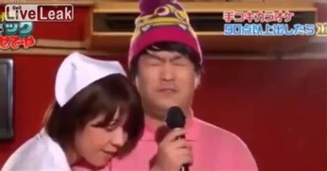 japanese hand job|Japanese game show where men get hand job while they sing .